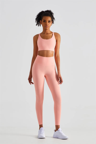 https://www.girlintuitive.com/cdn/shop/files/Empower_Seamless_High-Waist_Leggings_peachy_grande.webp?v=1691489921